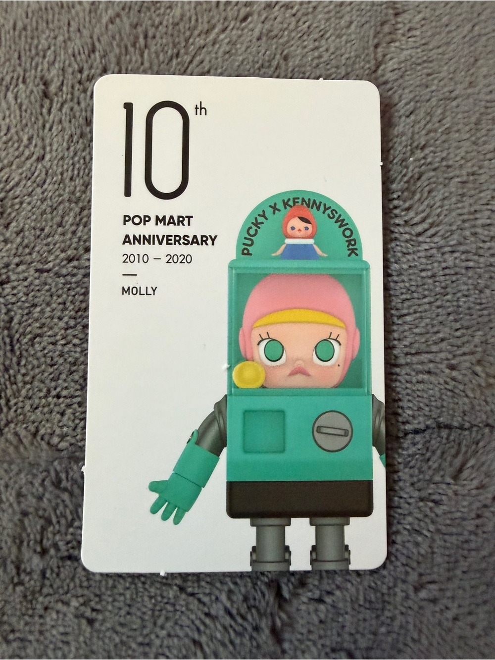 Discontinued Pop Mart x Kennyswork Molly w a tiny Pucky on top.